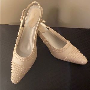 Pearl white shoes with pearl detailing